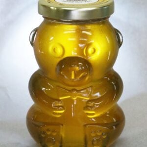 A 375g glass bear of our pure, raw Kootenay Wildflower honey.